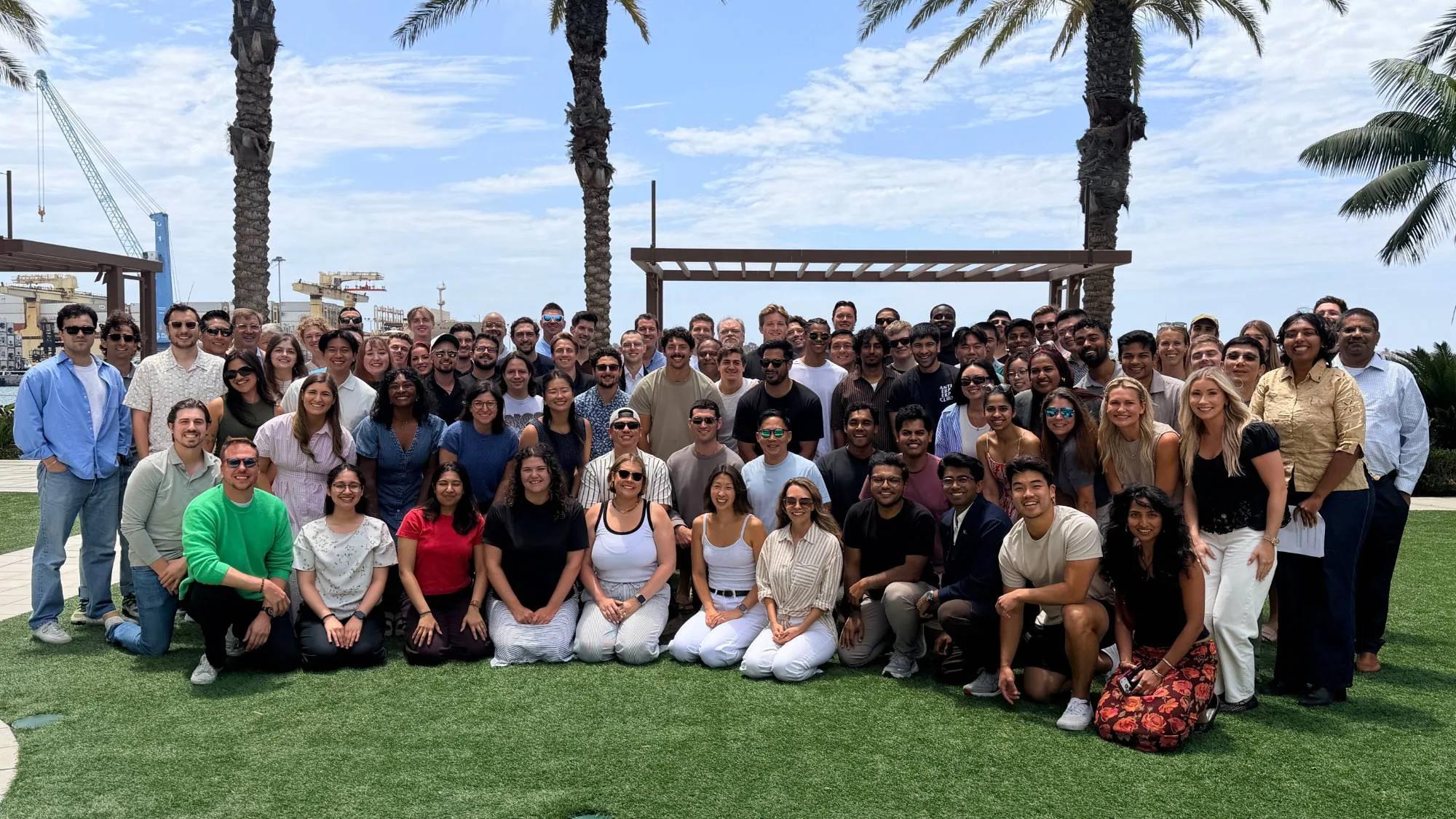 The DOSS team outdoors by the water