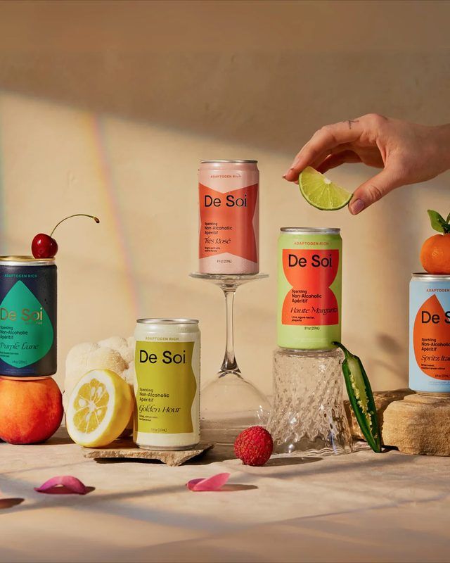De Soi cans and glasses in afternoon light