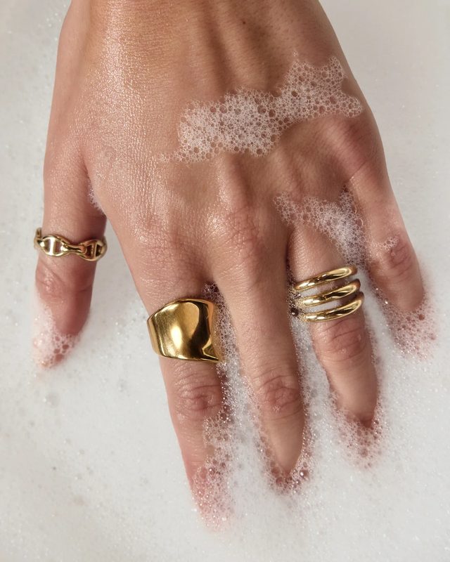 Gold rings worn on a hand